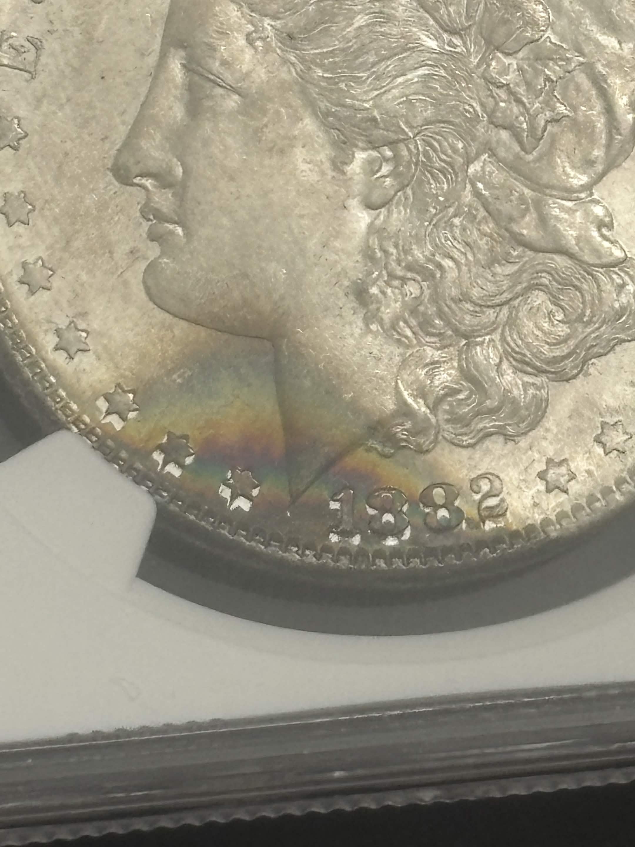 1882 S Morgan Dollar NGC MS-64 Obverse Rainbow Toned