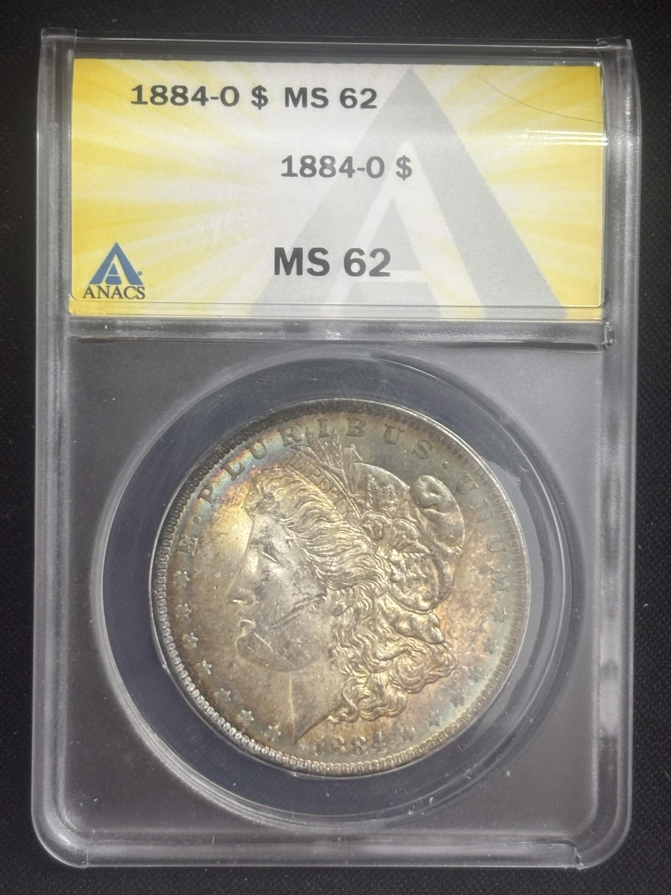 1884 O Morgan Dollar ANACS MS-62 Album Toned