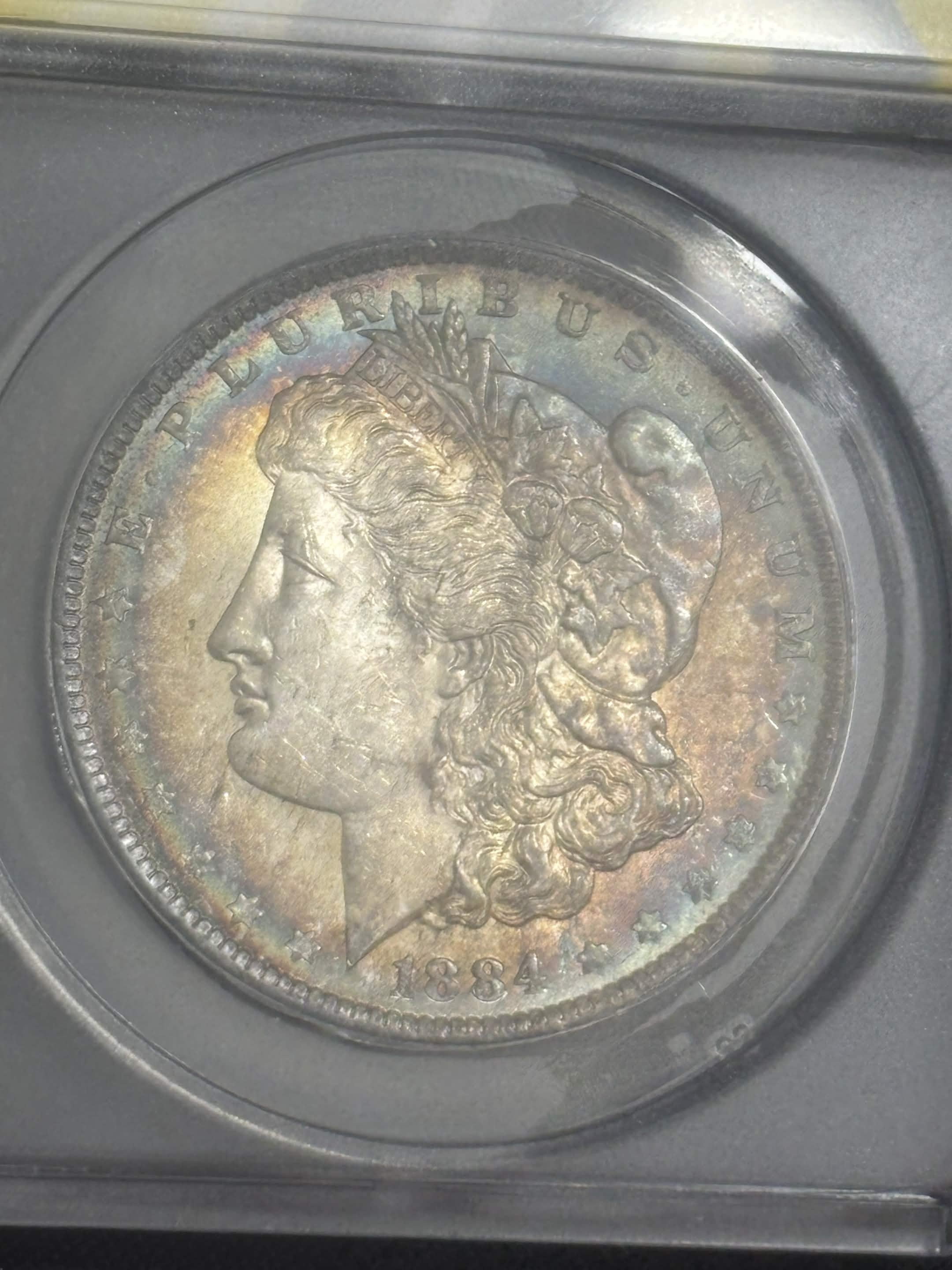 1884 O Morgan Dollar ANACS MS-62 Album Toned