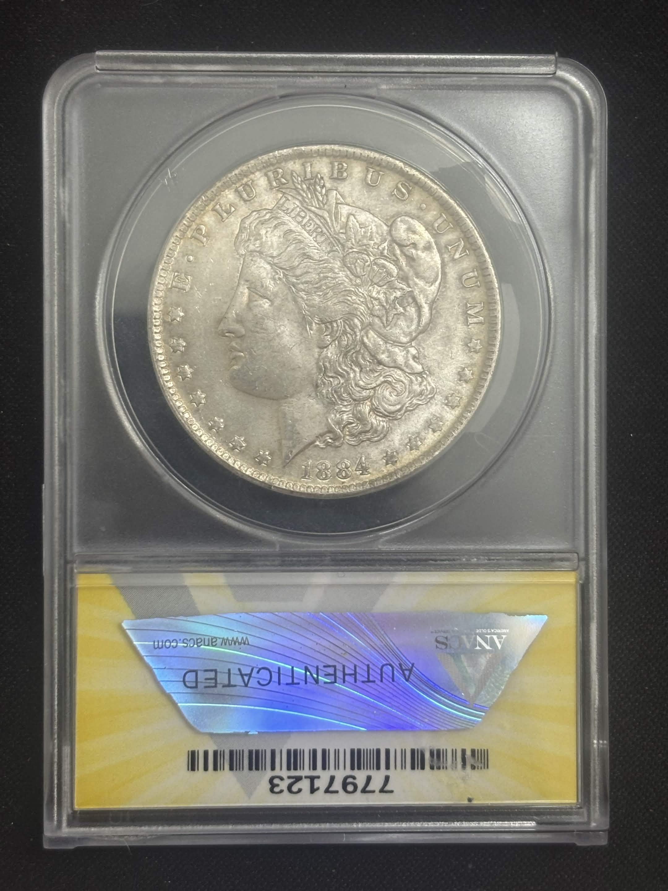 1884 O Morgan Dollar ANACS MS-63 Reverse Toned